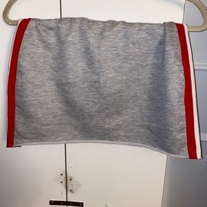 Green/red side stripe grey skirt